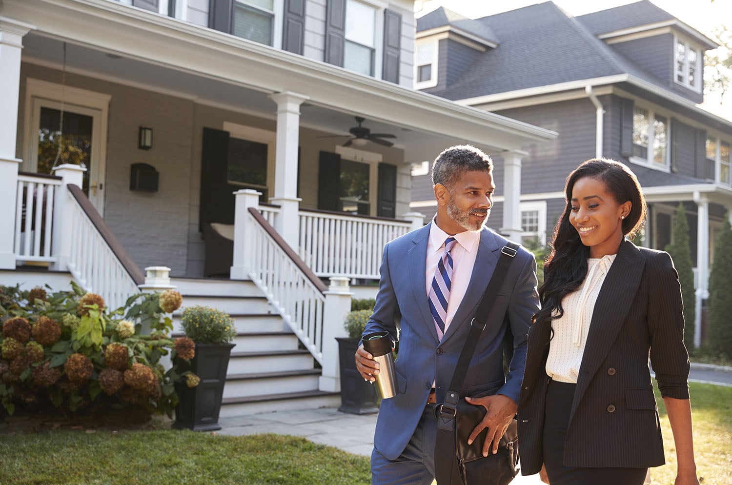 Man and a woman walking in Suburban