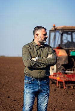 Man standing in field Gathering of individuals